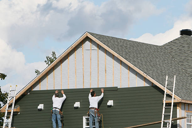 Professional Siding Replacement technician working in Linden, TN